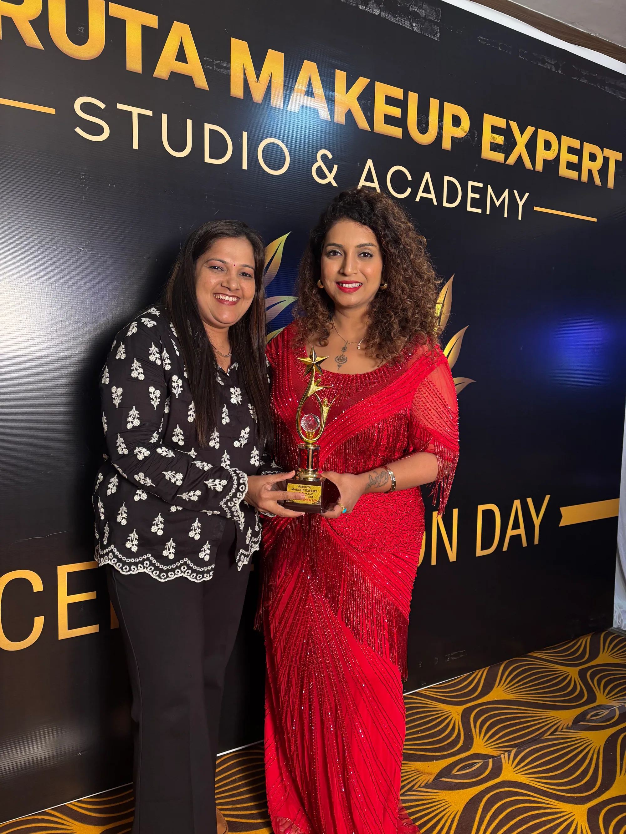 Neha with her runner-up trophy from Amruta Makeup Expert