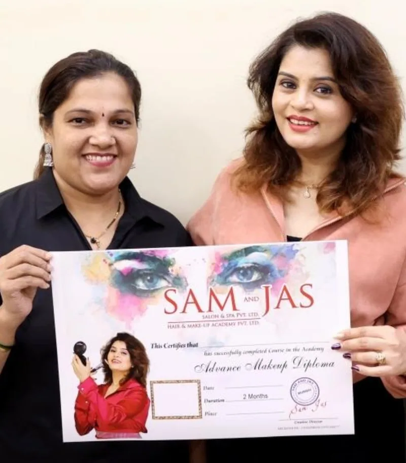 Neha receiving the Sam and Jas Advance Makeup Diploma
