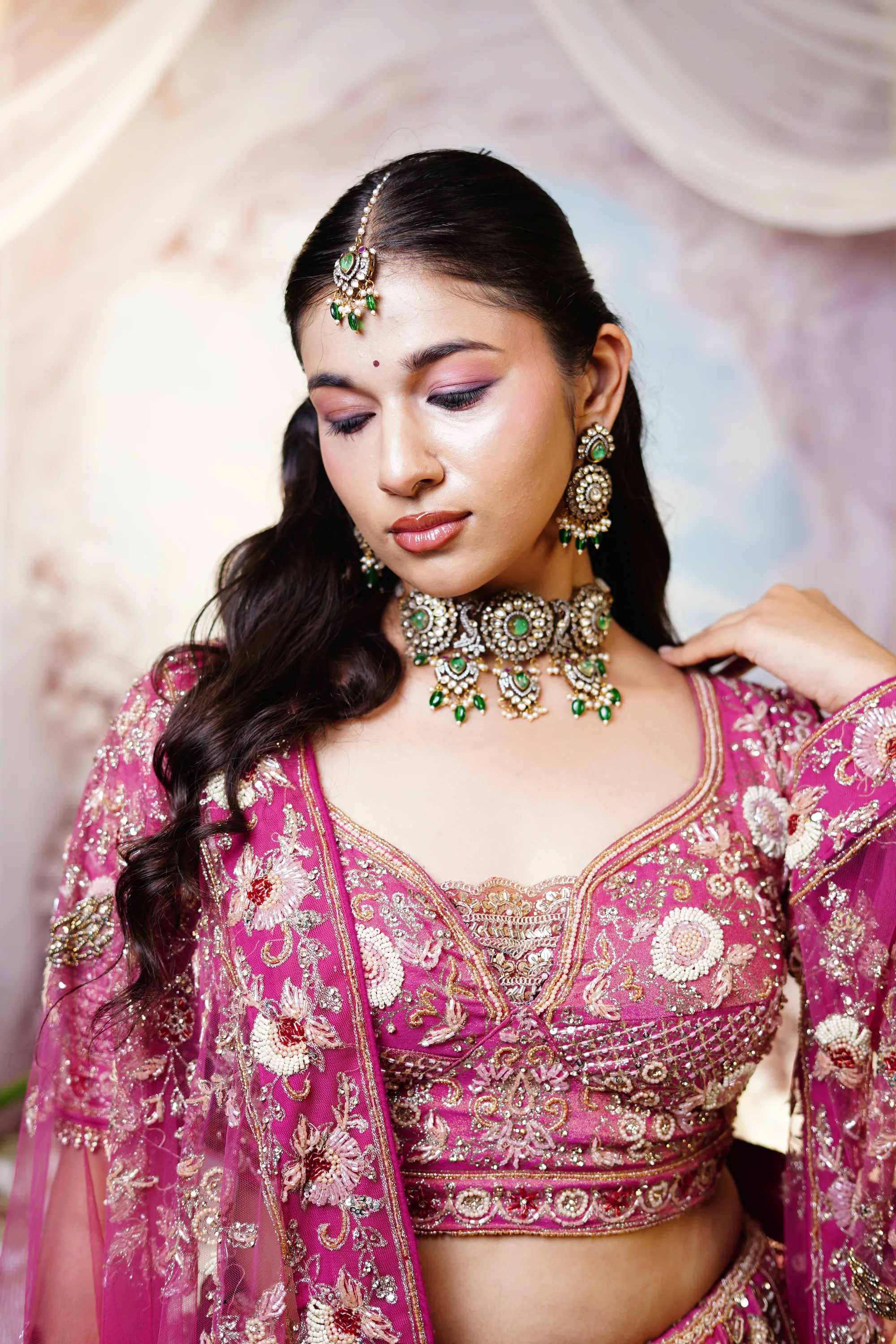 Close bridal portrait, soft magenta eye, eyes lowered